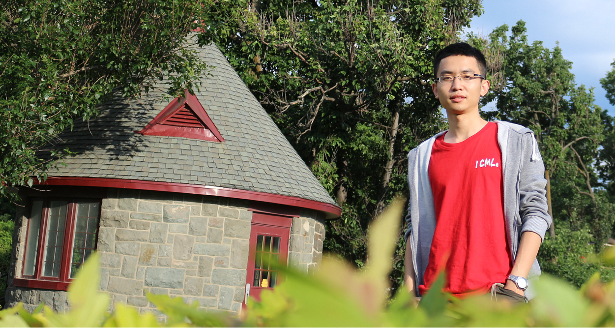 Fei Tian standing outdoors